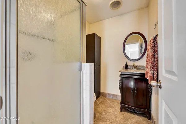 a bathroom with a bathtub and a toilet