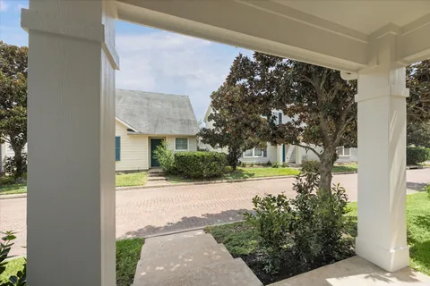 a view of a back yard of the house
