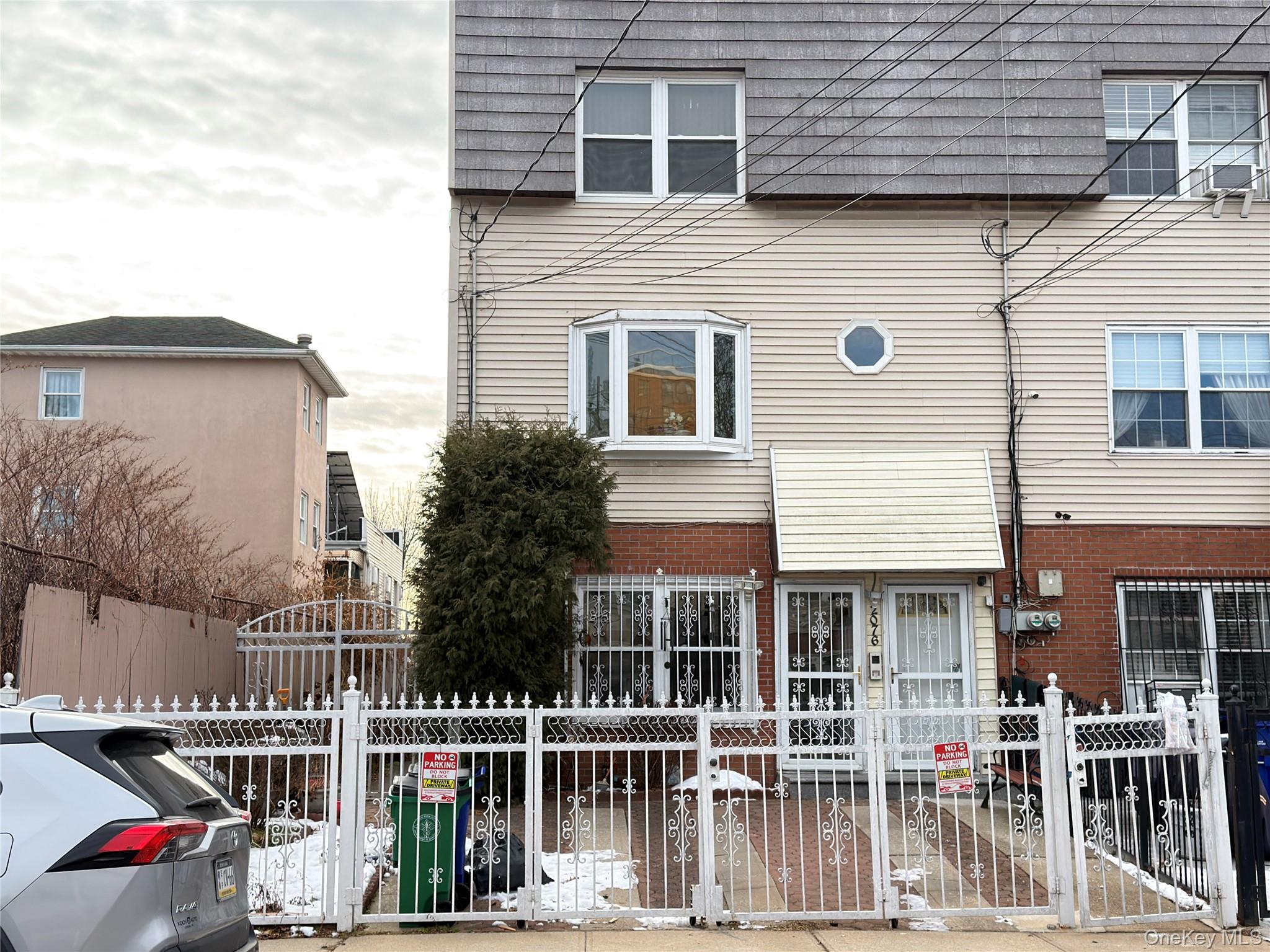 2076 Caesar Place Bronx, NY 10473 - Photo 1 of 8 a view of buildings with street view