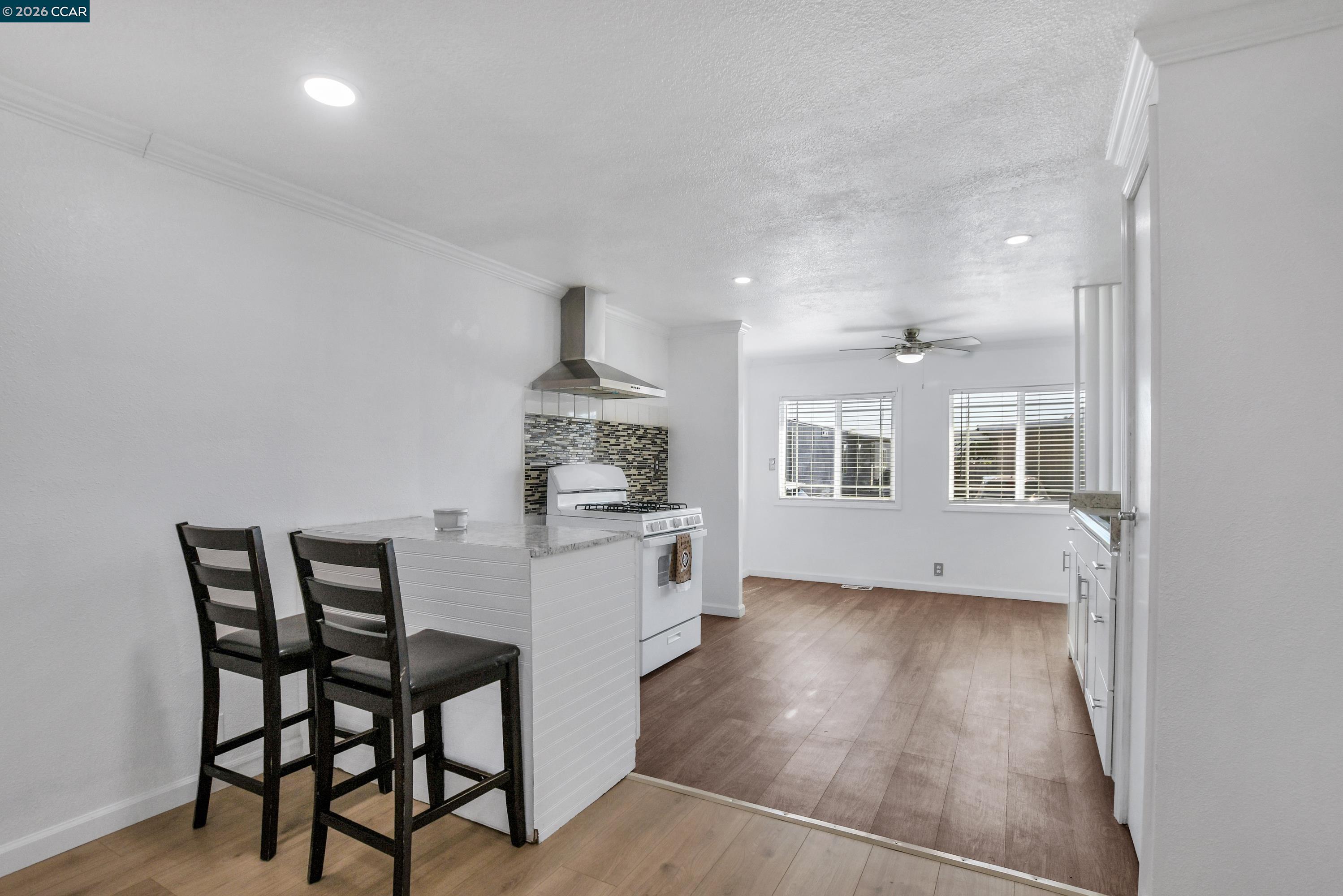237 Orangevale Pittsburg, CA 94565 - Photo 4 of 21 a kitchen with a table and chairs in it