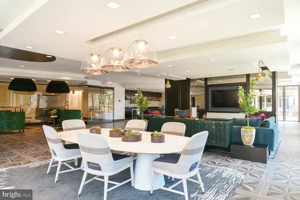 a view of a dining room with furniture