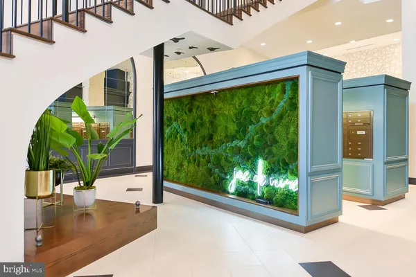 a view of swimming pool with outdoor seating and plants