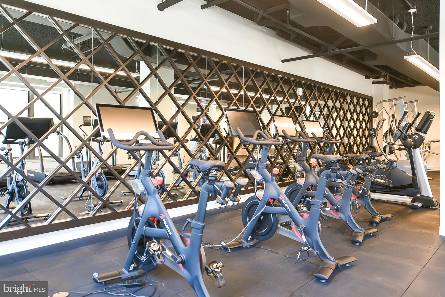 901 H Street Northeast, Unit AT D Washington, DC 20002 - Photo 60 of 82 a view of a room with gym equipment