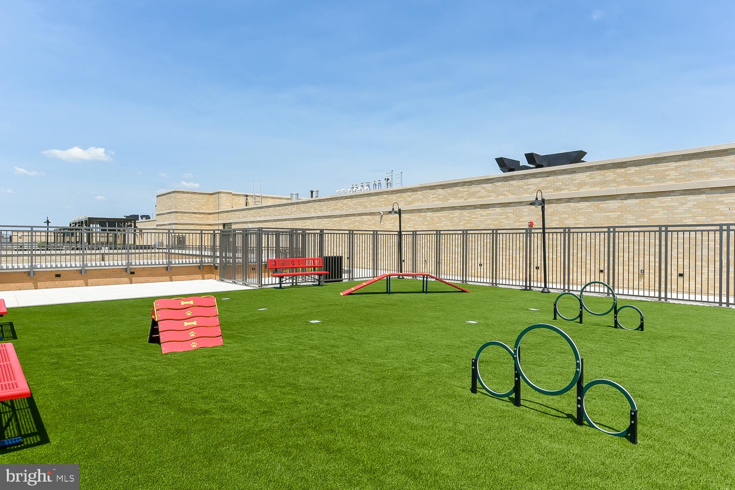 901 H Street Northeast, Unit AT D Washington, DC 20002 - Photo 64 of 82 a view of swimming pool with a yard and a garden