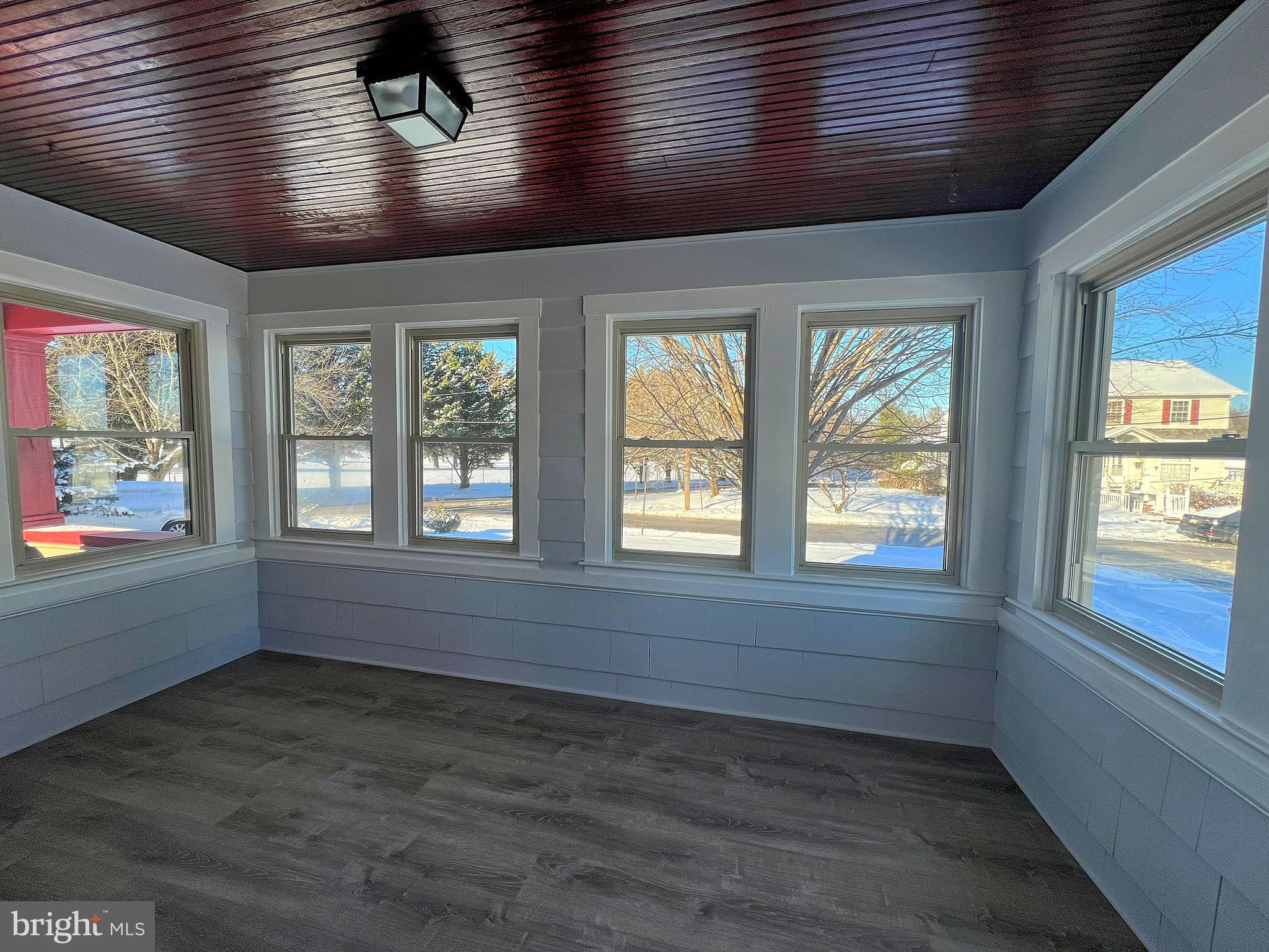 4311 Miami Place Baltimore, MD 21207 - Photo 5 of 26 wooden floor in an empty room with a window