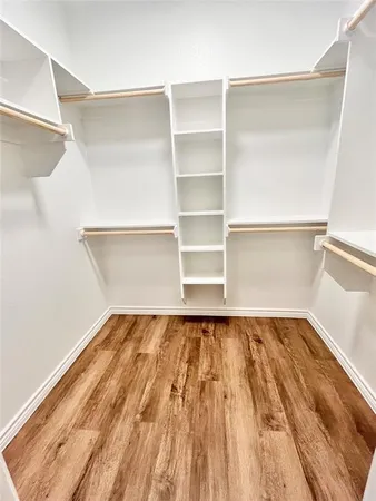a view of a room with shelf on the wall