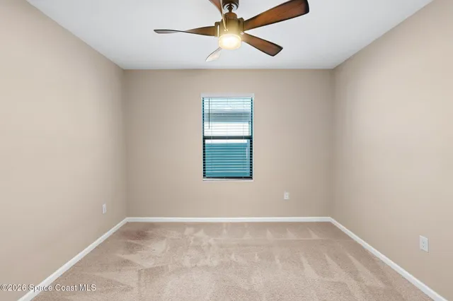 a view of a workspace with furniture