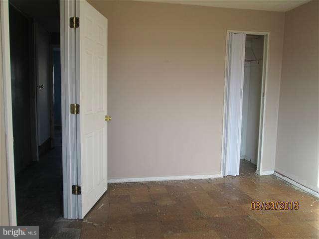 2106 Jasmine Road Baltimore, MD 21222 - Photo 10 of 17 a view of a hallway with closet