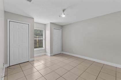 3718 Southwest Masilunas Street Port St. Lucie, FL 34953 - Photo 11 of 20 a view of an empty room and window