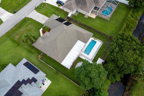 3718 Southwest Masilunas Street Port St. Lucie, FL 34953 - Photo 2 of 20 an aerial view of a house