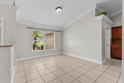 3718 Southwest Masilunas Street Port St. Lucie, FL 34953 - Photo 4 of 20 a view of an empty room and window