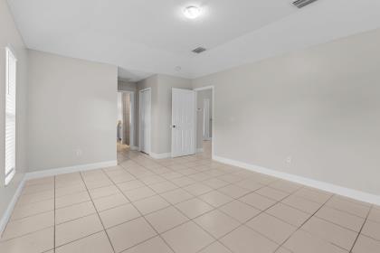 3718 Southwest Masilunas Street Port St. Lucie, FL 34953 - Photo 7 of 20 a view of an empty room