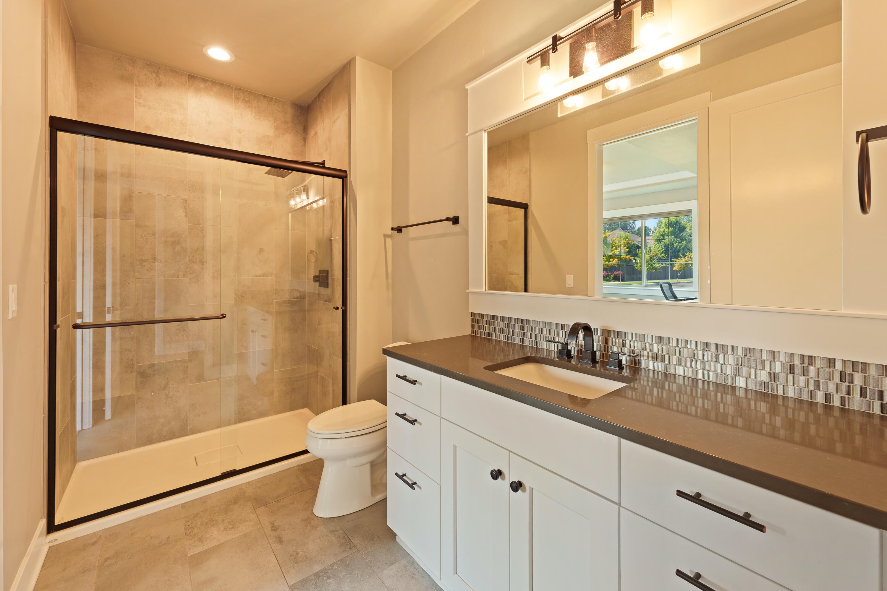 60869 Southwest Headwaters Loop Bend, OR 97702 - Photo 32 of 50 Guest suite bathroom with separate entrance to hallway