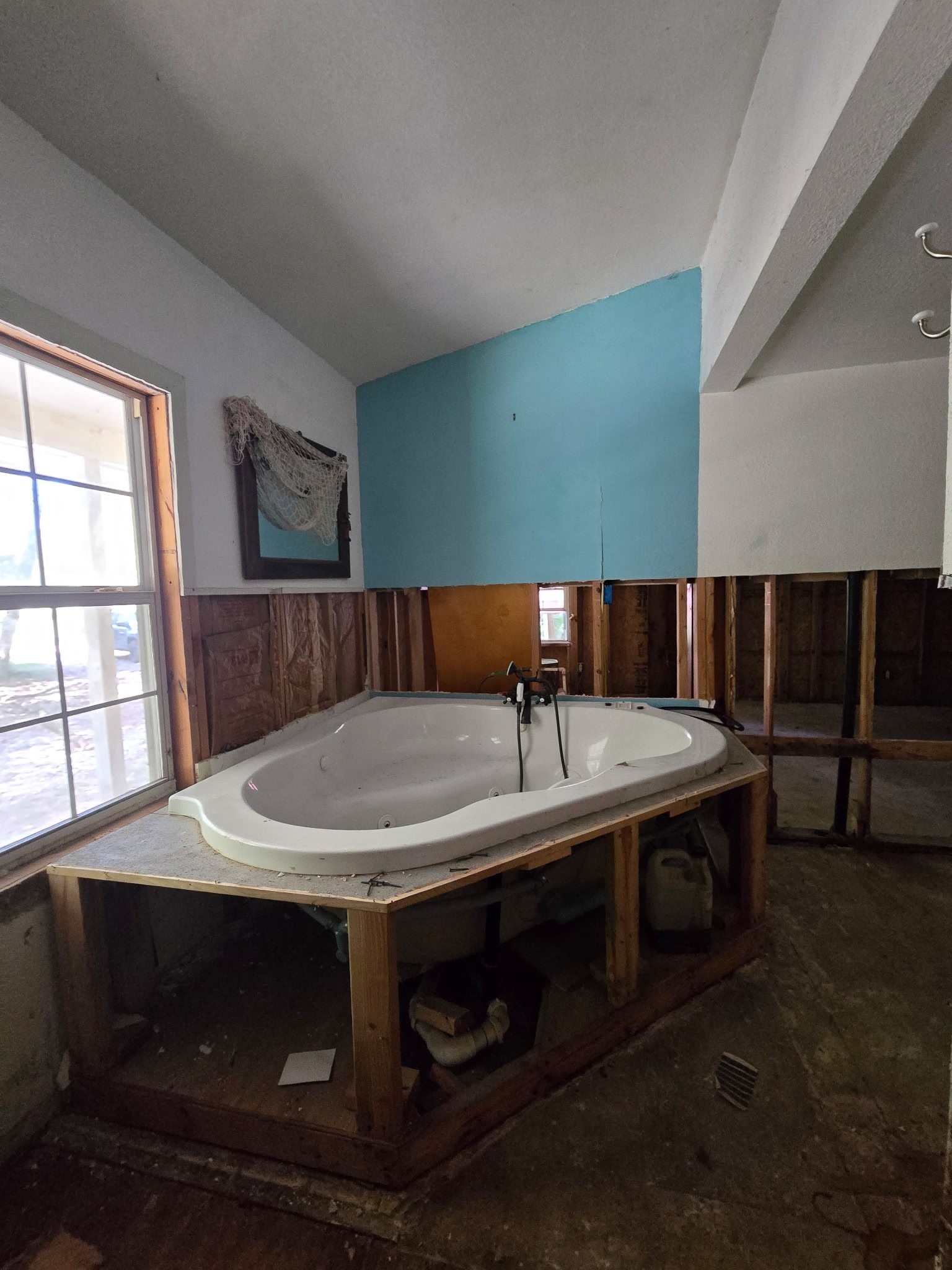 15 Caney Court Huntsville, TX 77320 - Photo 5 of 7 a bathroom with a sink and a mirror