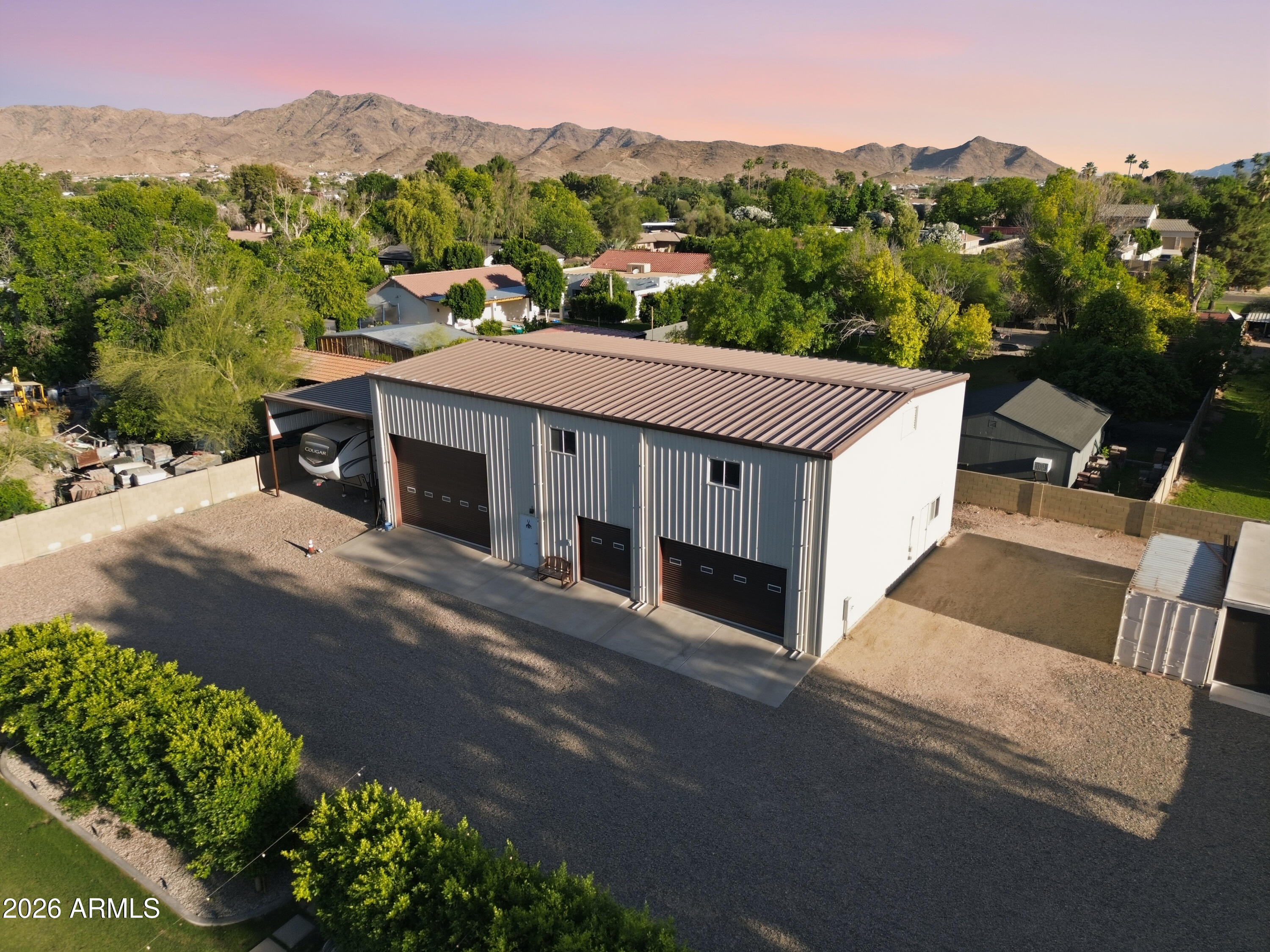 5213 West Dobbins Road Laveen, AZ 85339 - Photo 11 of 69 a view of a house with a mountain