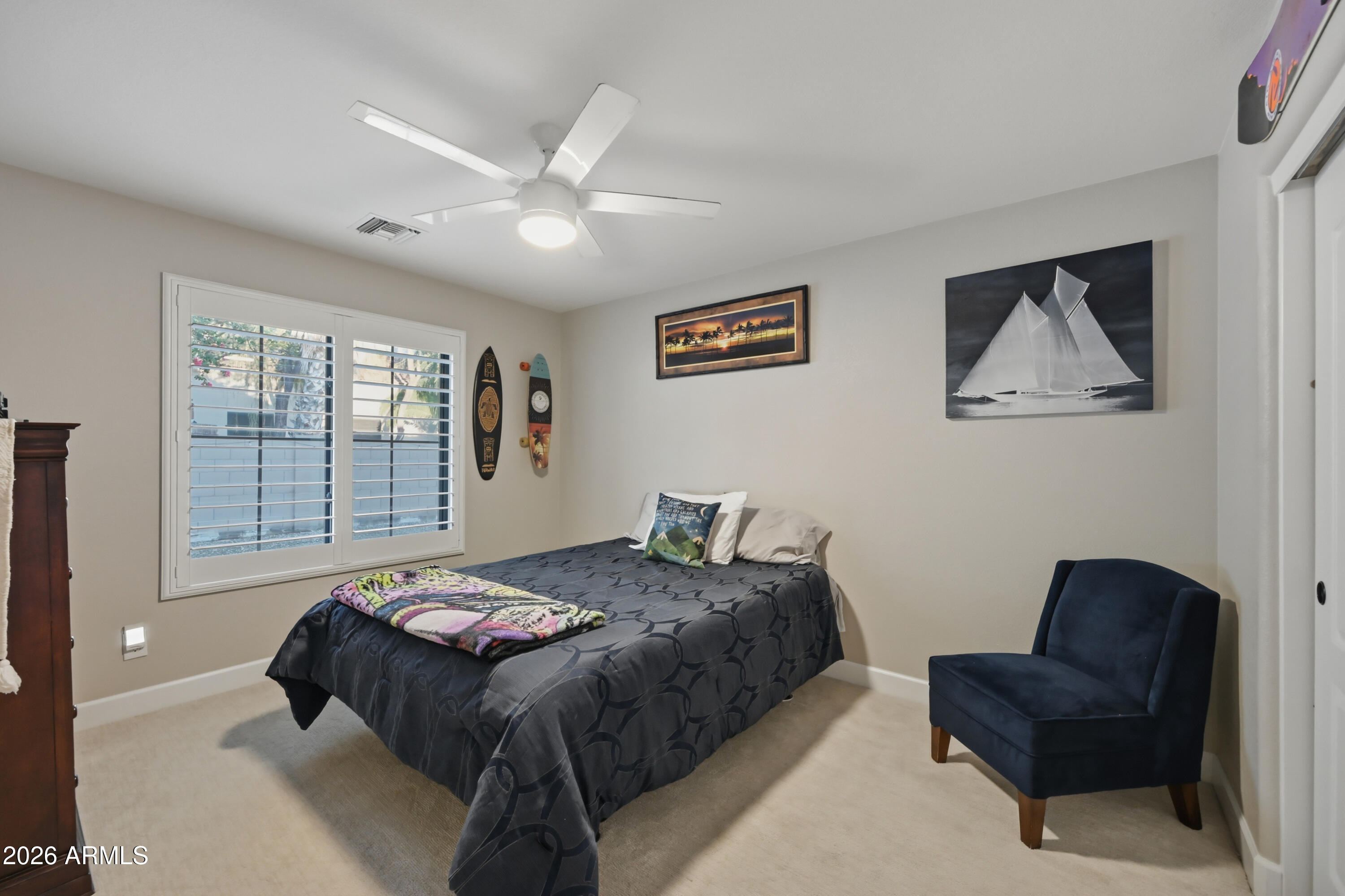 5213 West Dobbins Road Laveen, AZ 85339 - Photo 43 of 69 a bedroom with a bed and a couch