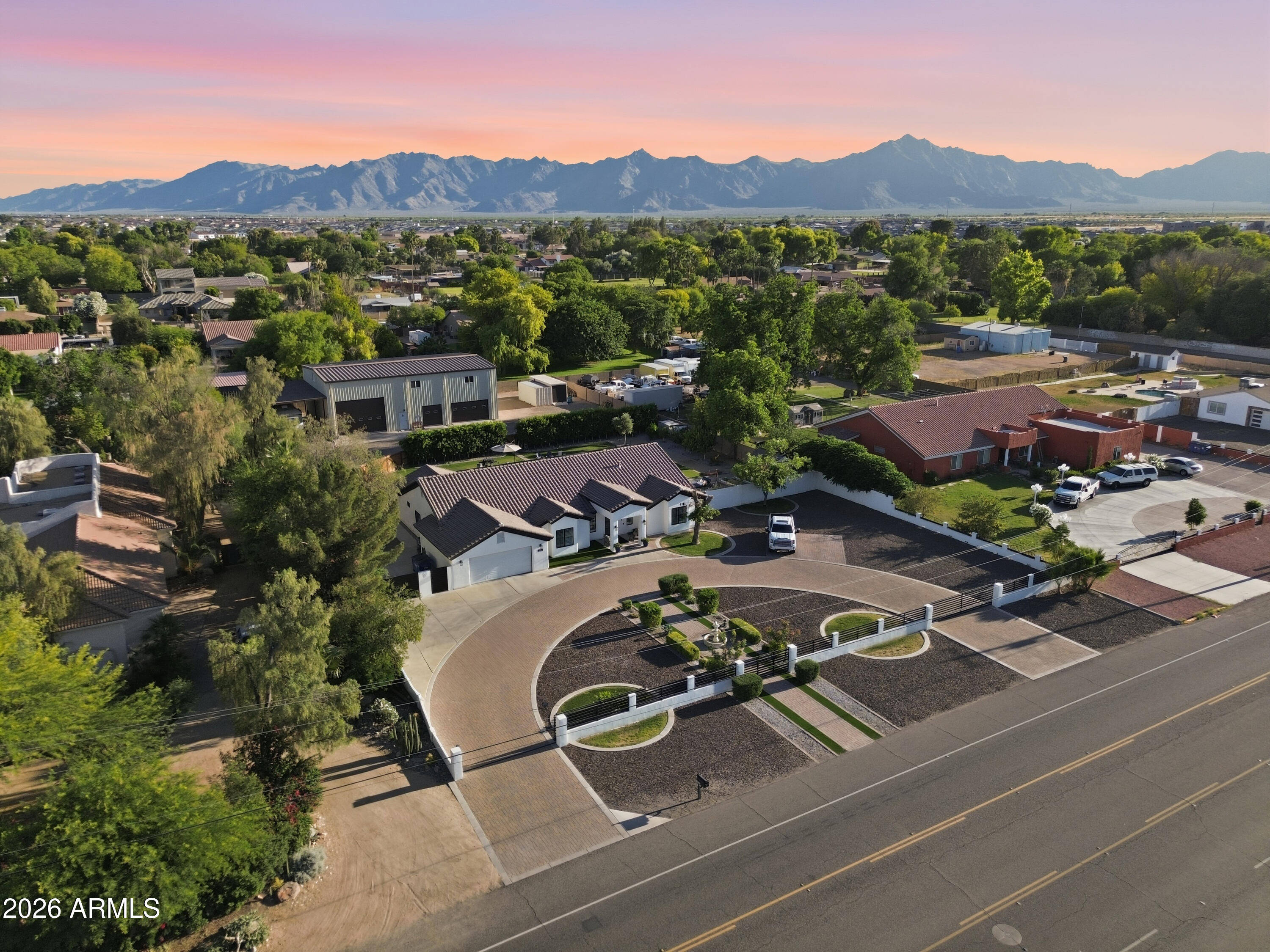 5213 West Dobbins Road Laveen, AZ 85339 - Photo 6 of 69 a view of a house with a garden