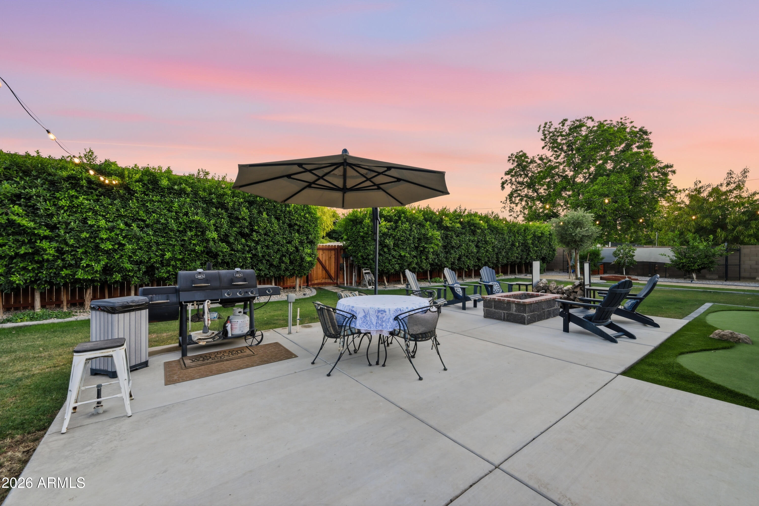 5213 West Dobbins Road Laveen, AZ 85339 - Photo 62 of 69 a view of backyard with sitting area and garden