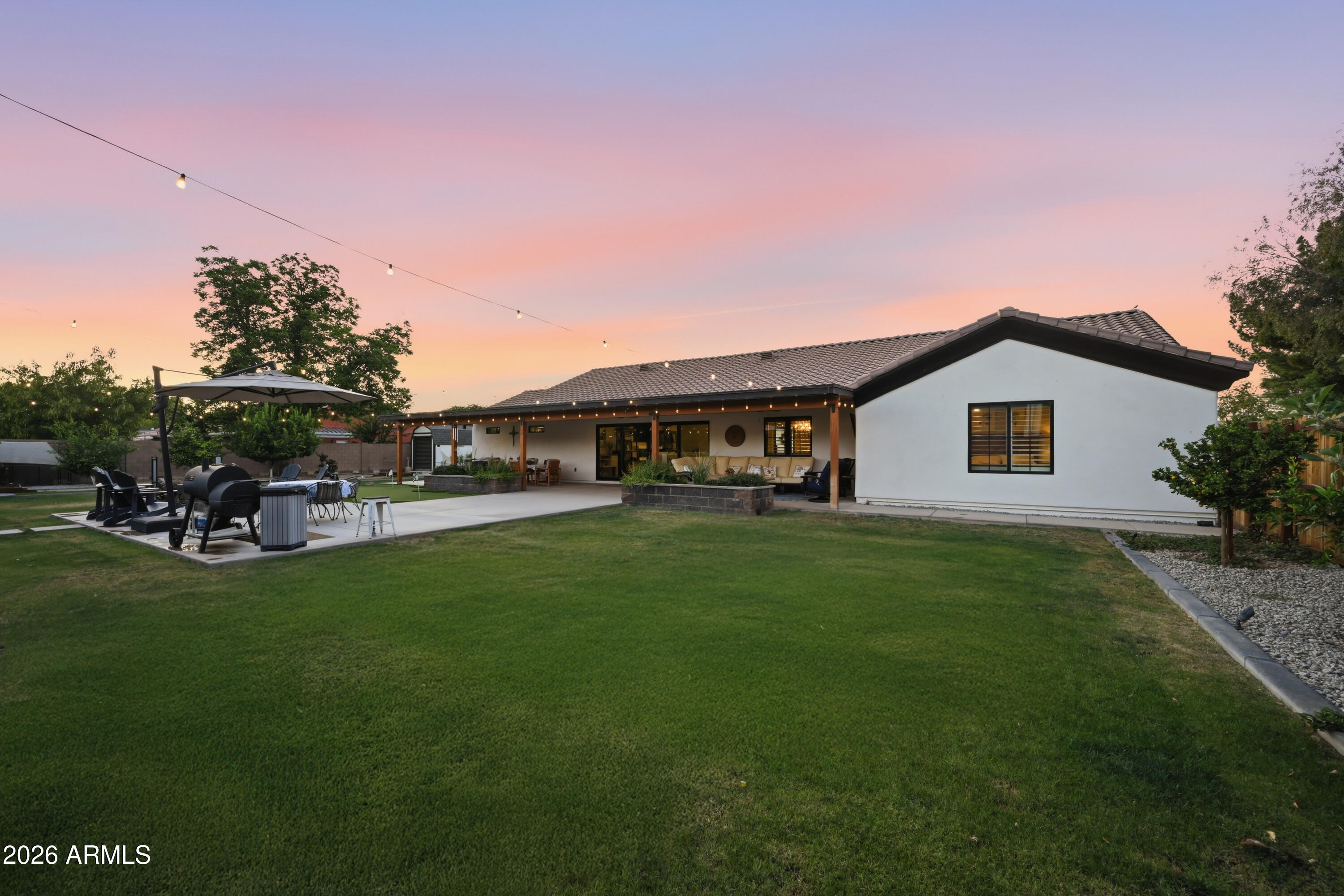 5213 West Dobbins Road Laveen, AZ 85339 - Photo 63 of 69 a view of a house with backyard sitting area and garden