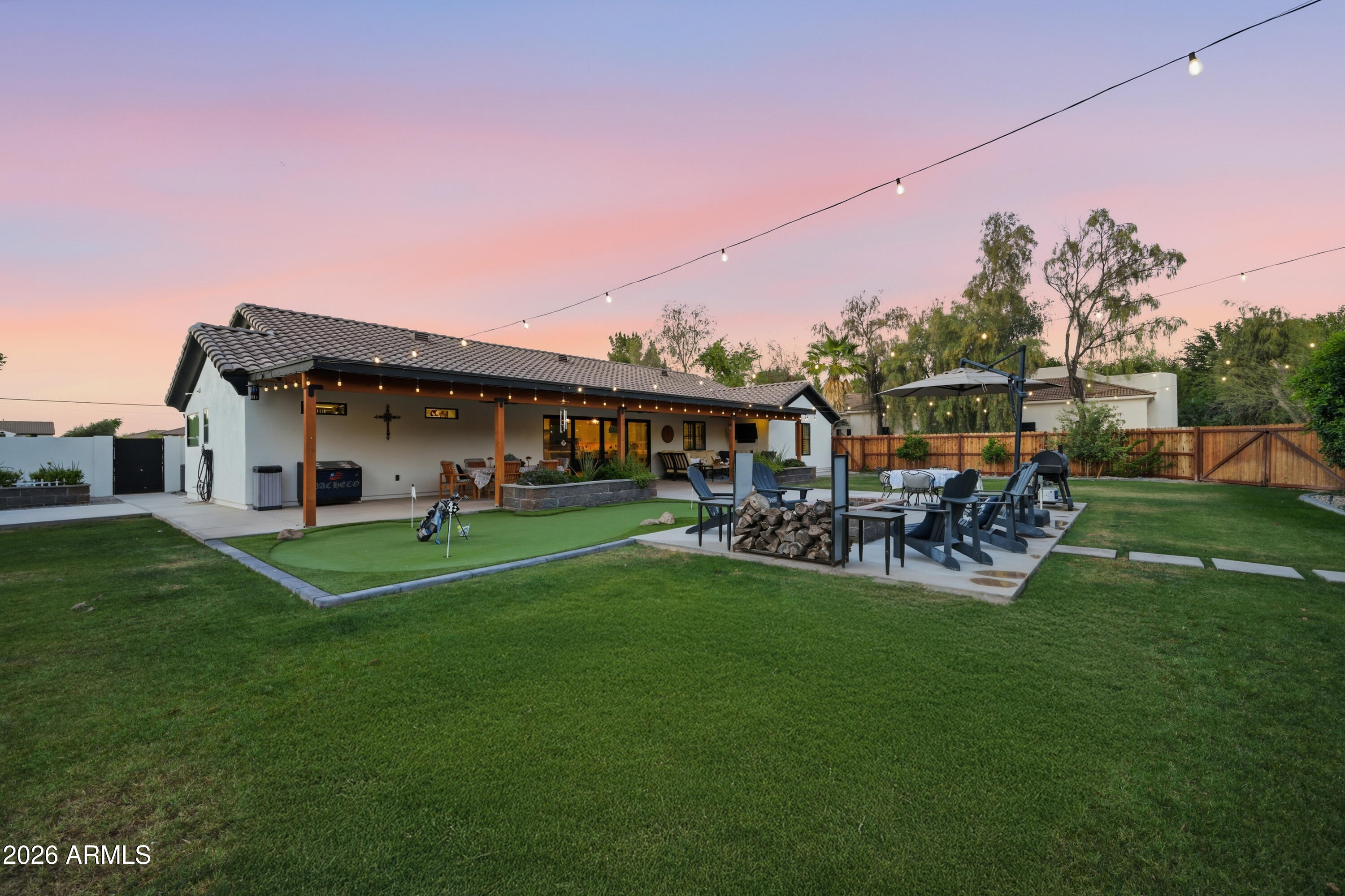 5213 West Dobbins Road Laveen, AZ 85339 - Photo 66 of 69 a view of a house with backyard porch and sitting area