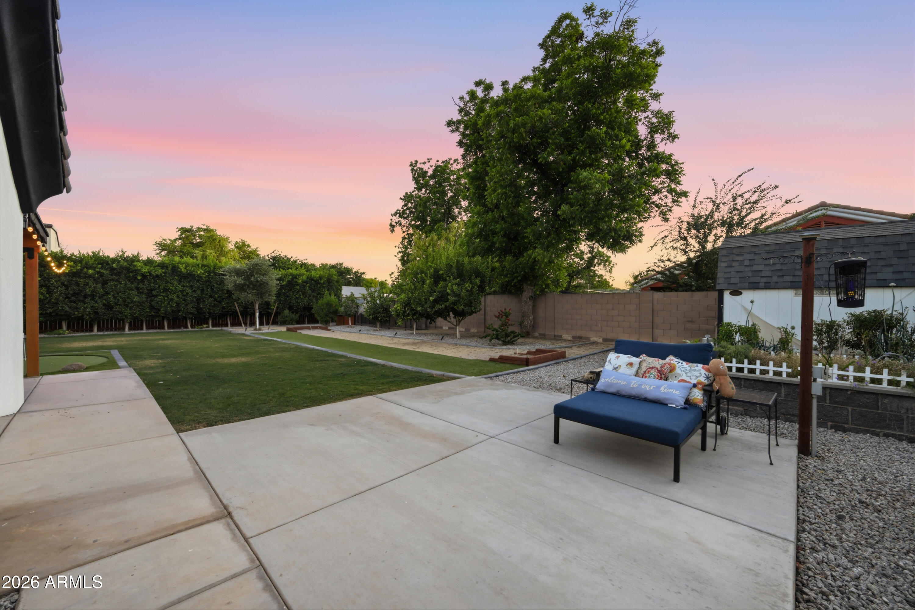 5213 West Dobbins Road Laveen, AZ 85339 - Photo 67 of 69 a view of backyard with outdoor seating and a garden