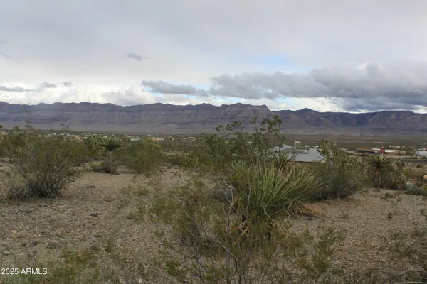 a view of a lake with mountains in the background