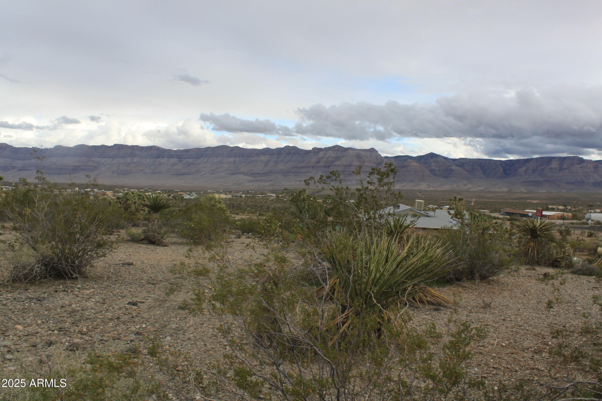 a view of a lake with mountains in the background