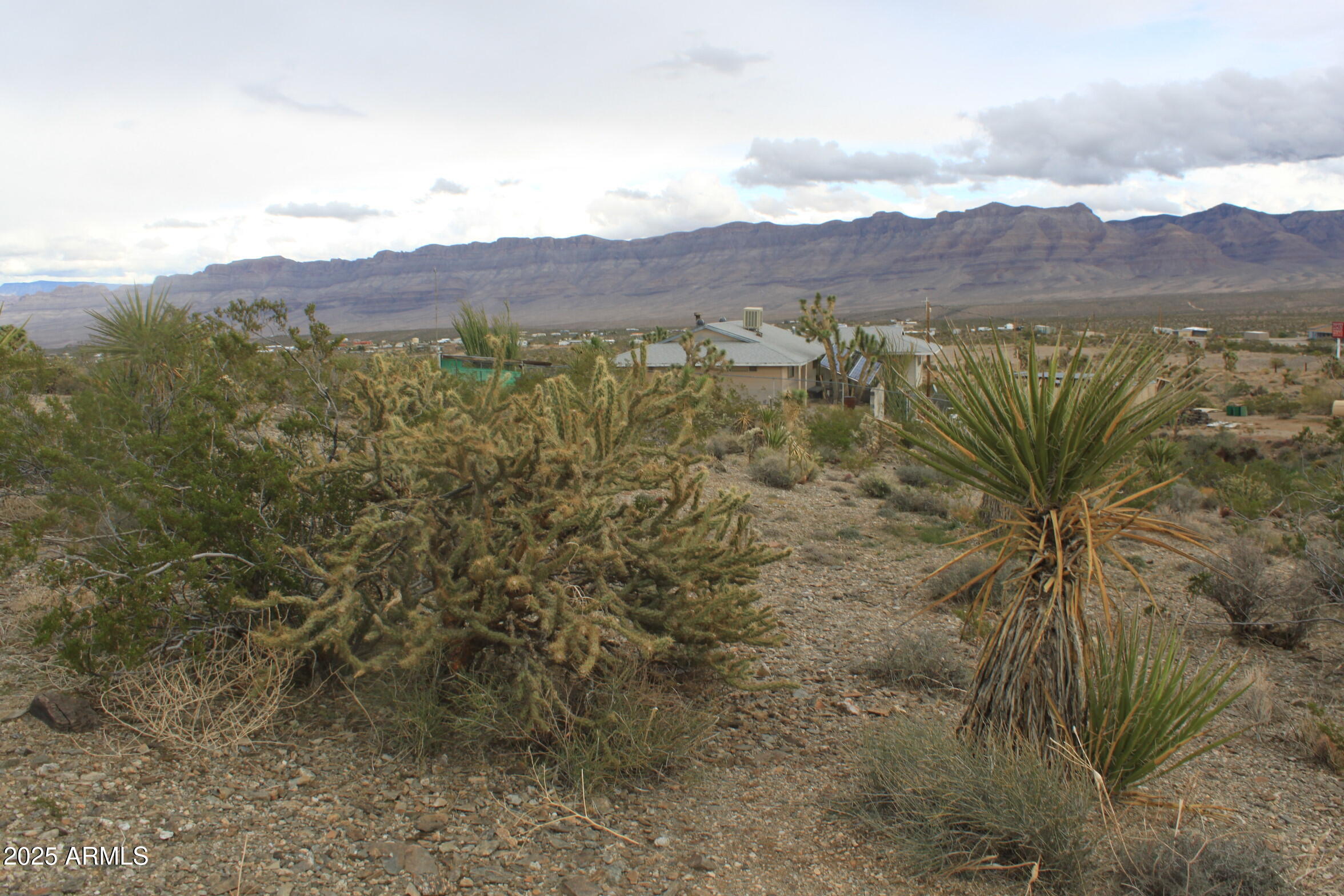 1765 Fortification Drive, Unit 736 Meadview, AZ 86444 - Photo 10 of 10 a view of a town with mountains in the background
