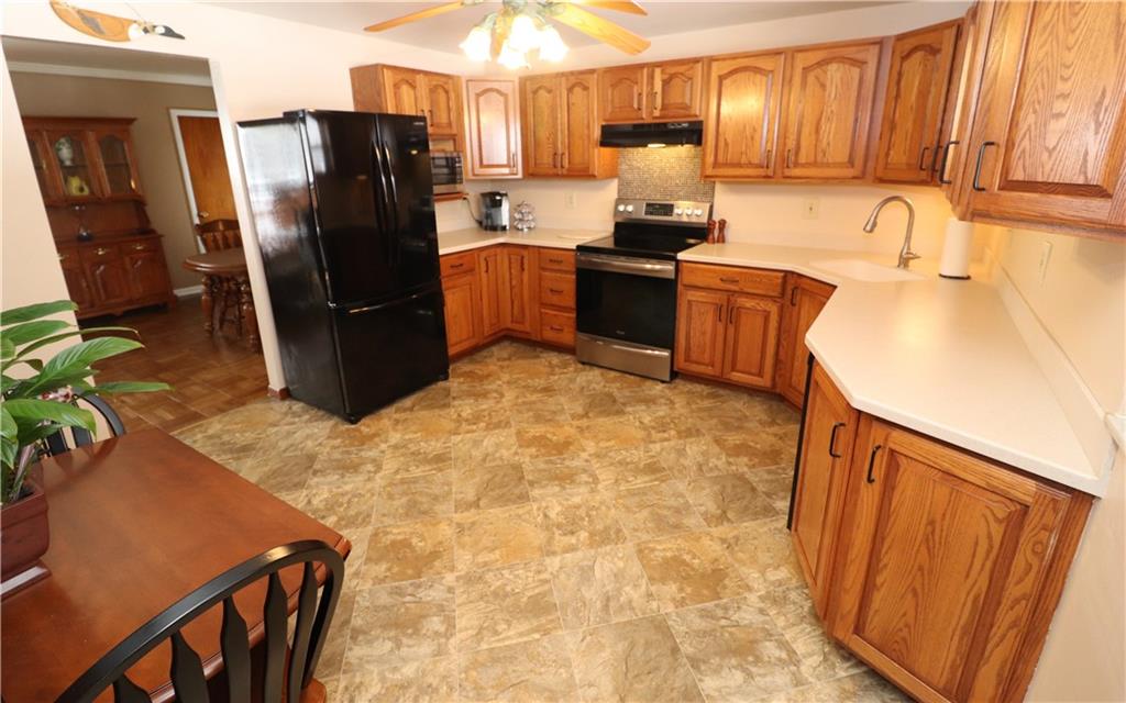 351 Grange Road Rochester, PA 15074 - Photo 8 of 24 View2 of the kitchen highlights the newer appliances, ceiling fan w/lights and the Cozy Eat-in Area.