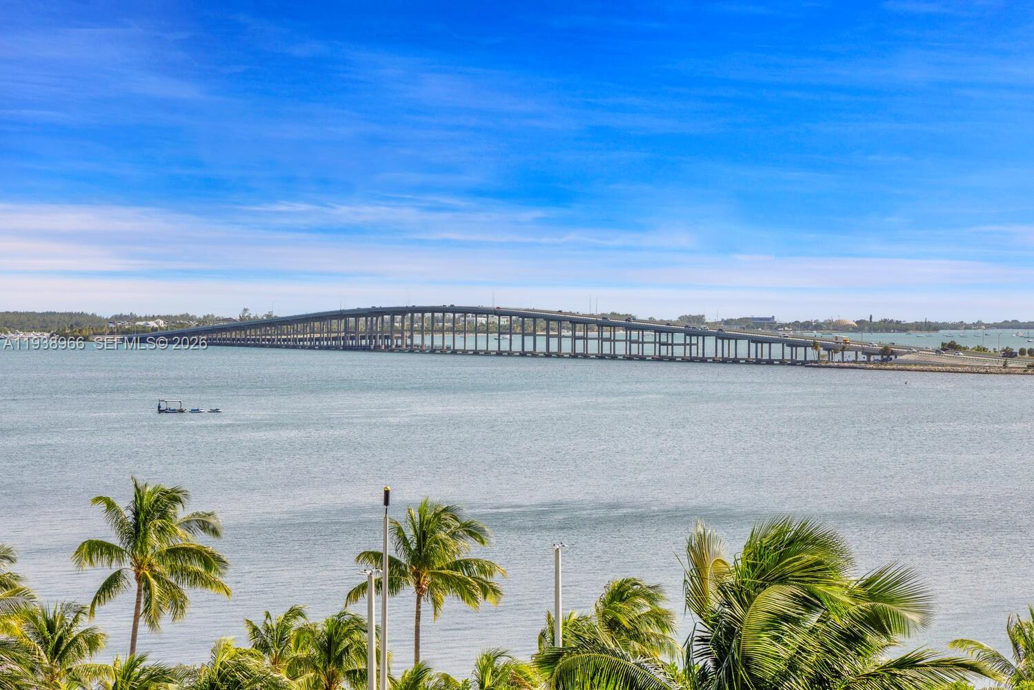 a view of a lake with a big yard