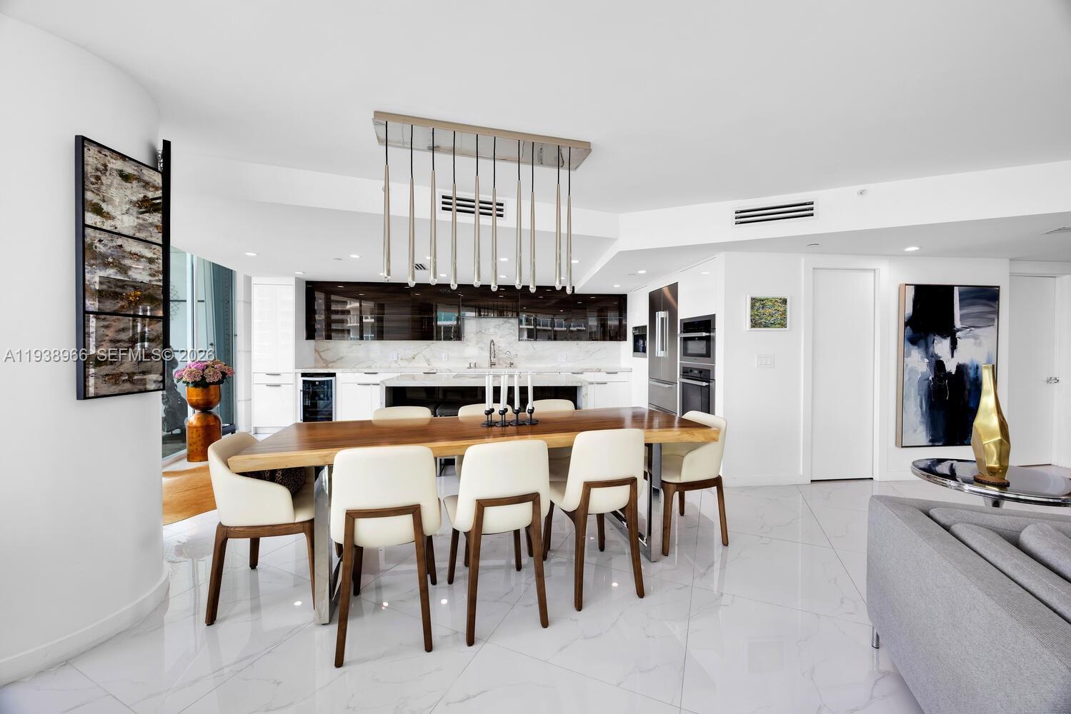 2127 Brickell Avenue, Unit 801 Miami, FL 33129 - Photo 11 of 38 a view of a dining room with furniture