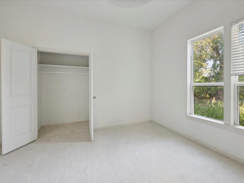 2290 Orange Avenue Beaumont, TX 77701 - Photo 11 of 12 an empty room with windows
