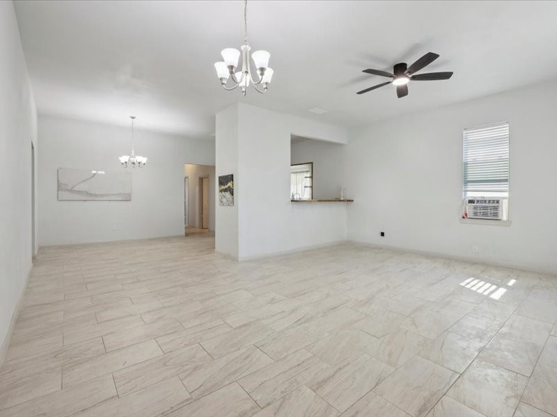 2290 Orange Avenue Beaumont, TX 77701 - Photo 2 of 12 a view of empty room with a ceiling fan
