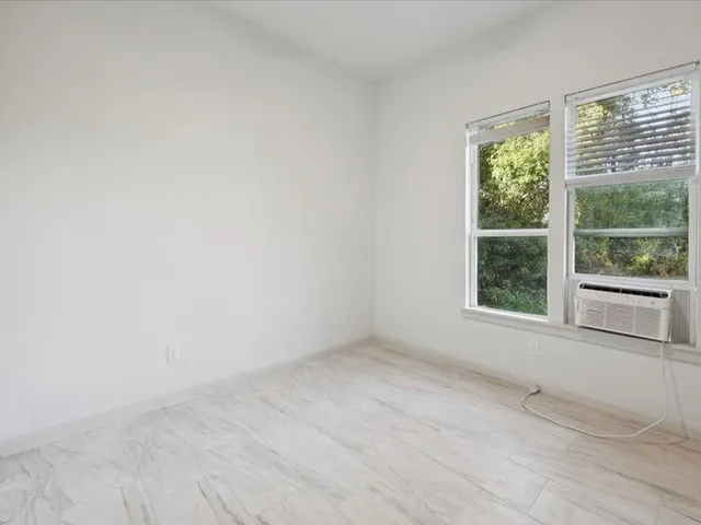 an empty room with a window