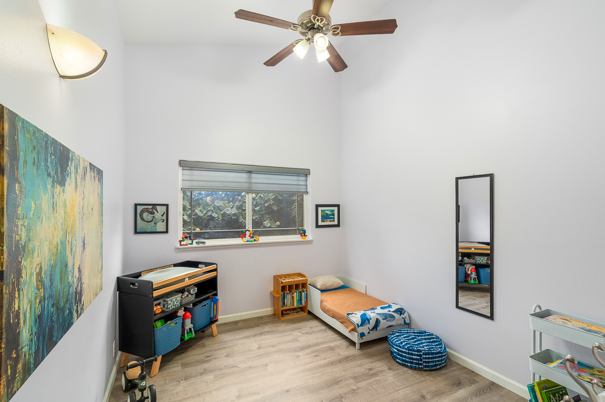 68-1846 Puu Nui Street Waikoloa, HI 96738 - Photo 17 of 29 a room with furniture and a window