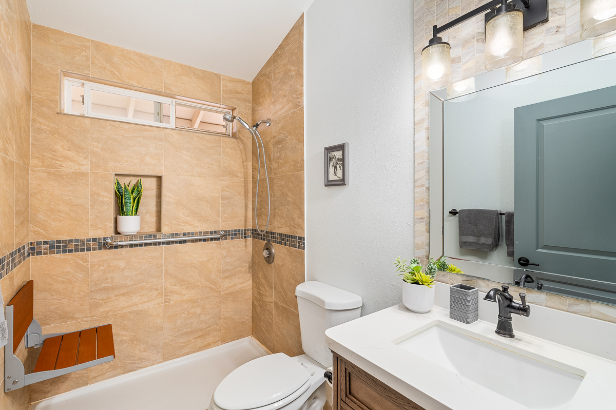 68-1846 Puu Nui Street Waikoloa, HI 96738 - Photo 18 of 29 a bathroom with a sink toilet and shower