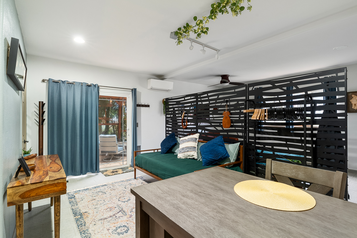 68-1846 Puu Nui Street Waikoloa, HI 96738 - Photo 25 of 29 a kitchen with a table and chairs in it