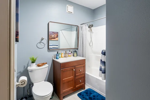 a view of a house with a window and brick walls
