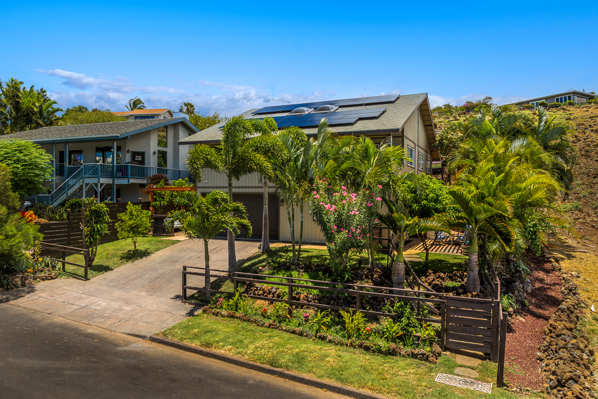 68-1846 Puu Nui Street Waikoloa, HI 96738 - Photo 3 of 29 a view of a patio with table and chairs and potted plants