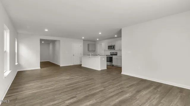 a view of kitchen with wooden floor