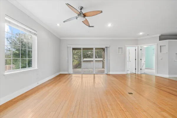a view of a porch with a floor to ceiling window