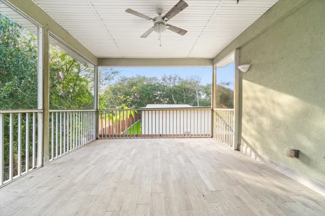 a view of a two chairs and table in the balcony
