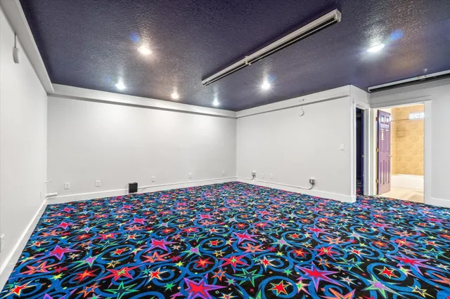 a view of a swimming pool and an outdoor space