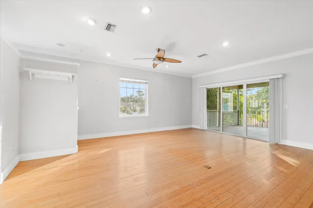 a view of a kitchen with a sink and a cabinet