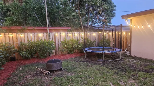 a garden view with a seating space