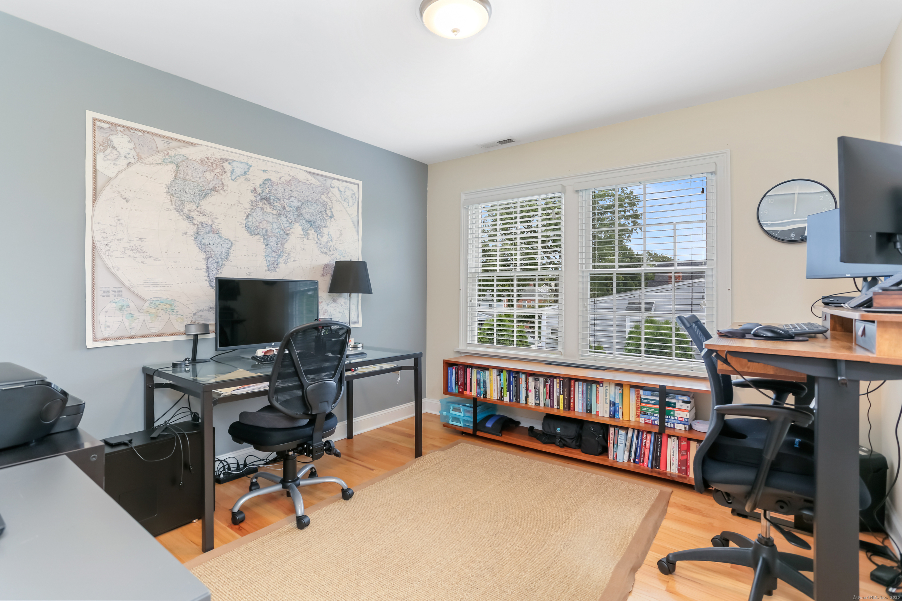 162 Country Road, Unit 162 Fairfield, CT 06824 - Photo 21 of 33 a view of a workspace with furniture and a window