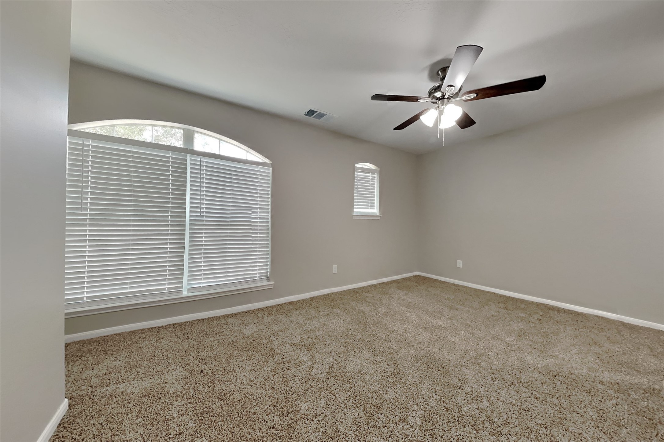 19710 Ringwald Court Spring, TX 77379 - Photo 15 of 20 a view of an empty room with a window