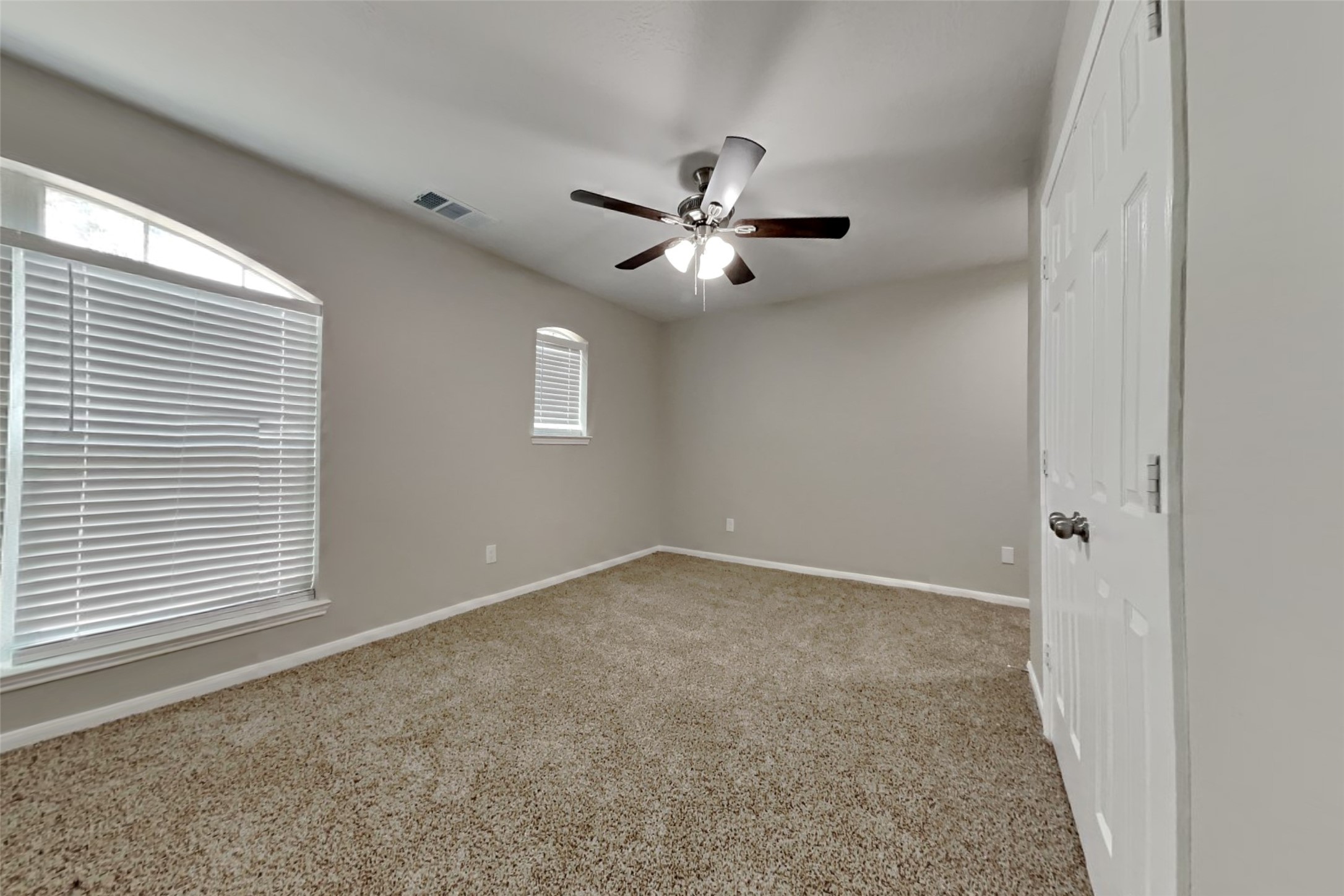 19710 Ringwald Court Spring, TX 77379 - Photo 16 of 20 a view of an empty room with a window