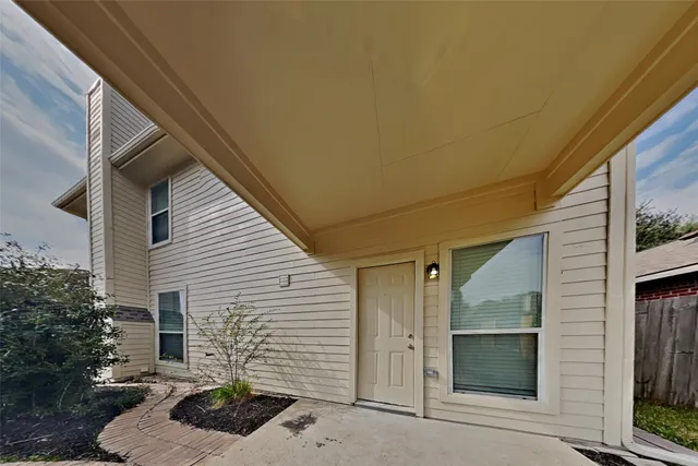 a front view of a house with garage