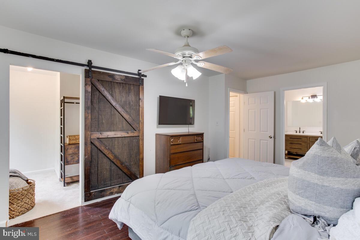 13185 Joy Road Lusby, MD 20657 - Photo 30 of 58 Beautiful Master bedroom with barn door is perfect